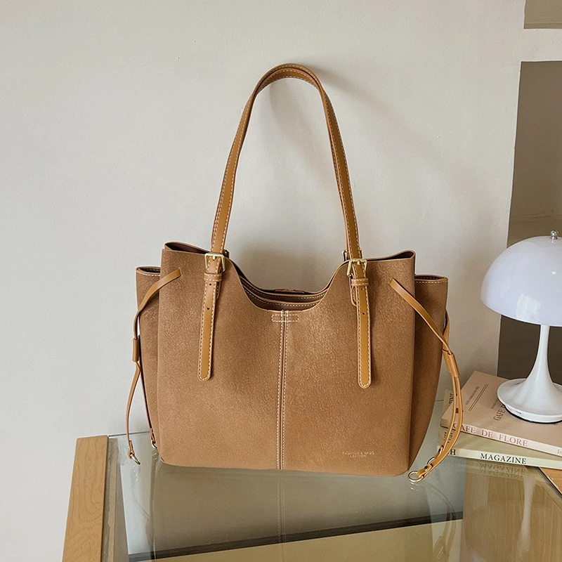 Luxe dames handtas met kwastje - Leatherwork Designs recensie en prijs